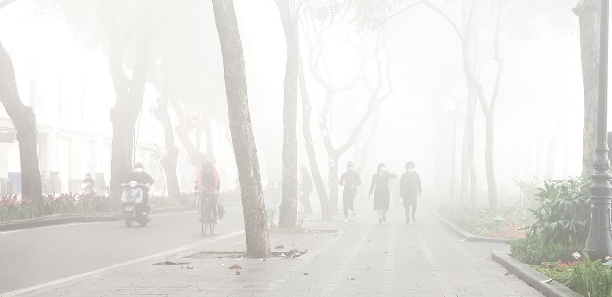 [Photo Story] Hà Nội chìm trong sương mù